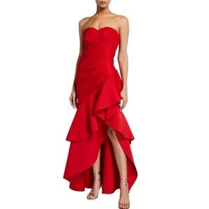Badgley Mischka: Red strapless, bustier high-low, side ruffle gown. Size 0.
